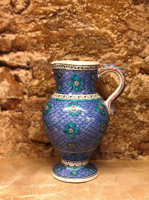 A highly rare polychrome Iznik tile with confronted birds